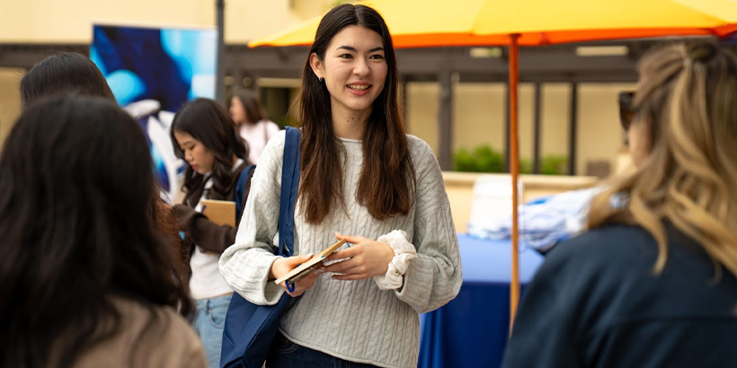 ELM-CNL program booth at a career fair