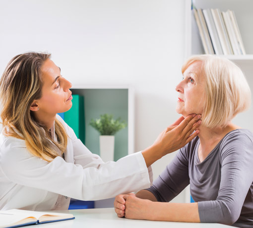 Speech-Language Pathologist with a patient