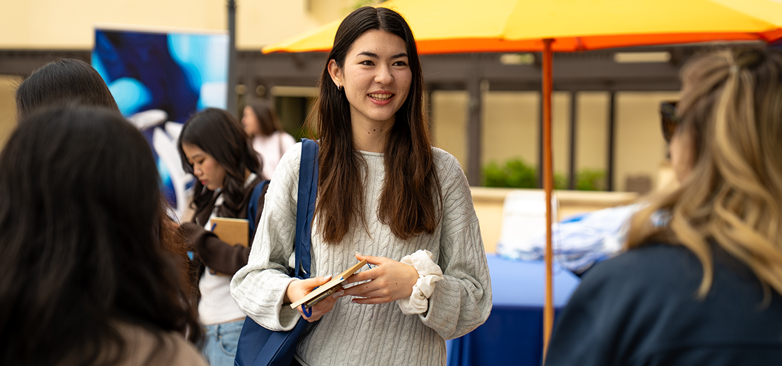 Student at School of Nursing Table