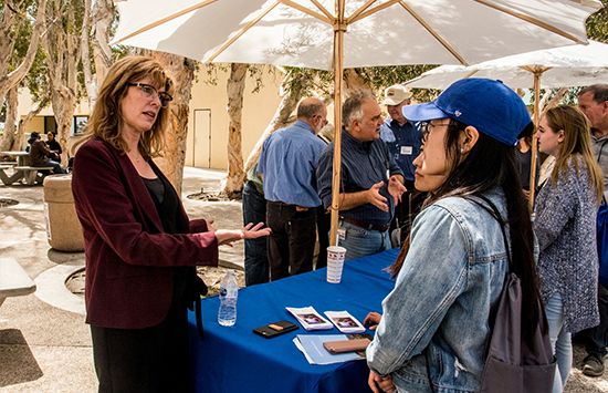 studnet talking to staff member